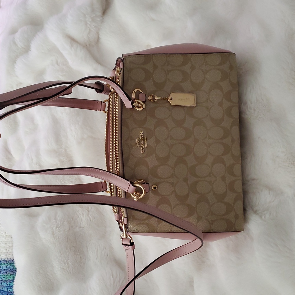 Coach pink and tan crossbody. medium/large purse